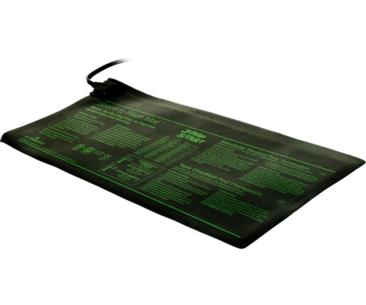Jump Start MT10006 seedling heat mat with printed growing instructions and power cord, angled view on white.