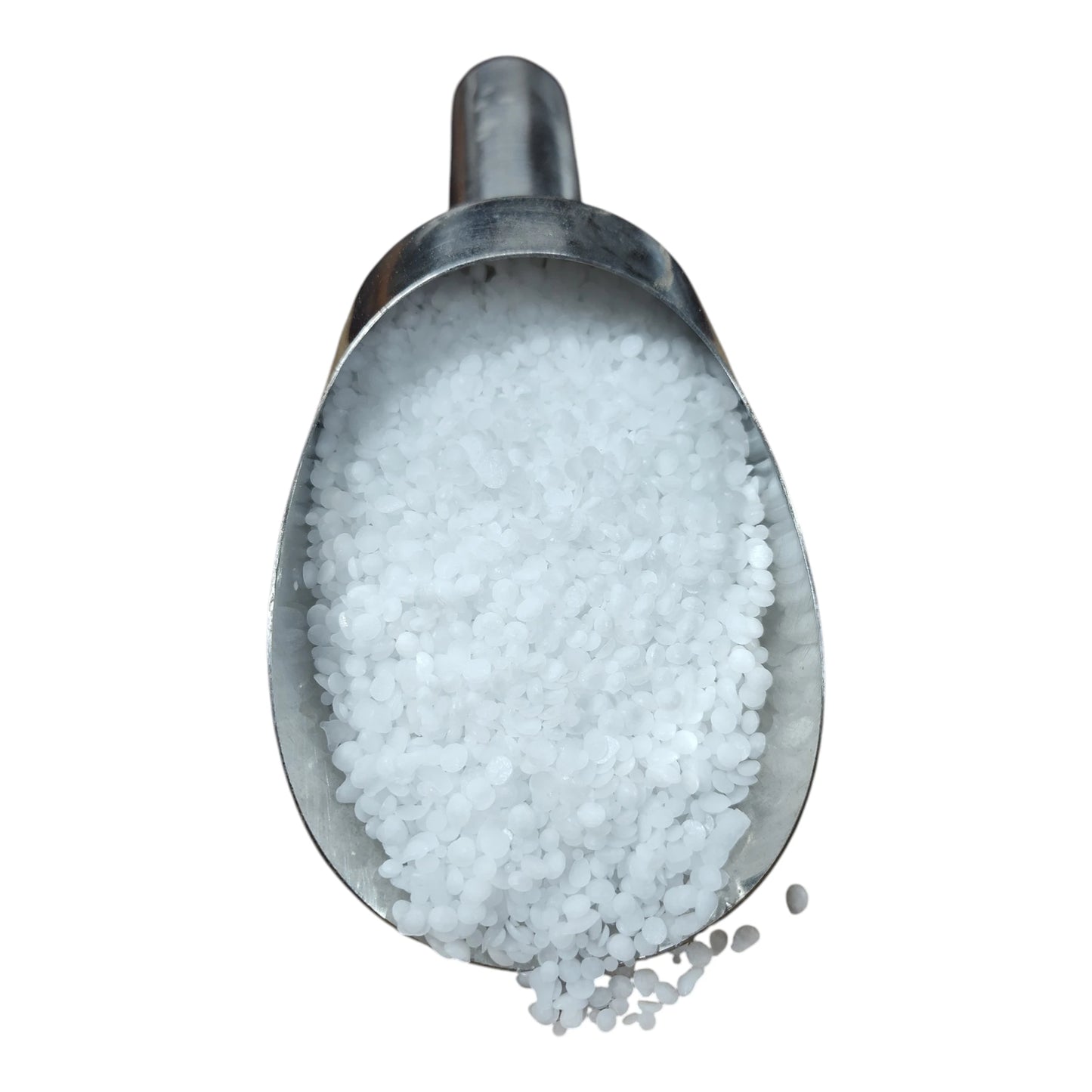 Haifa Magnisal magnesium nitrate prills in a stainless scoop on white background — pure white water-soluble fertilizer granules
