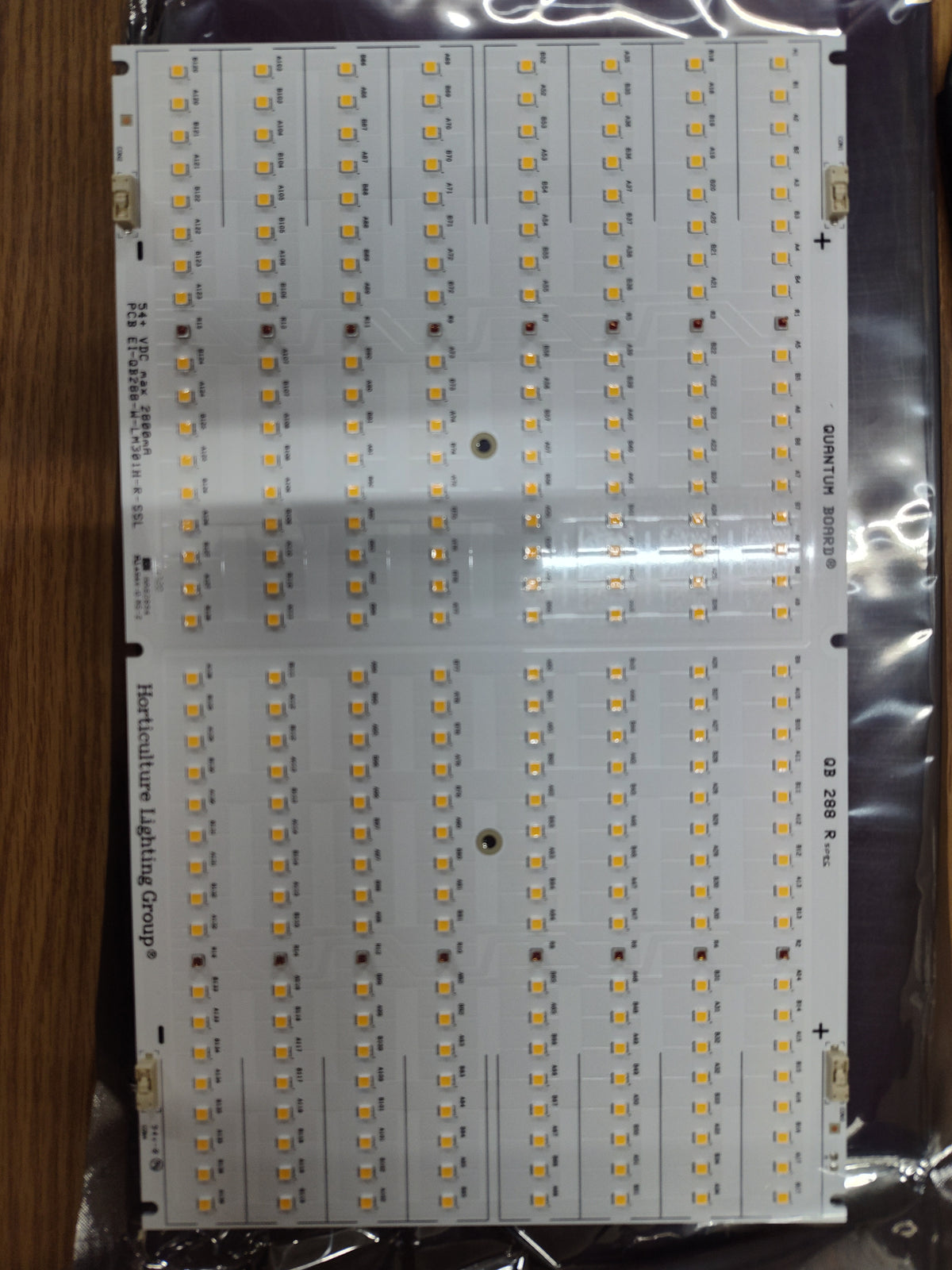 HLG QB288 Rspec Quantum Board close-up showing white and deep-red LEDs in protective packaging.