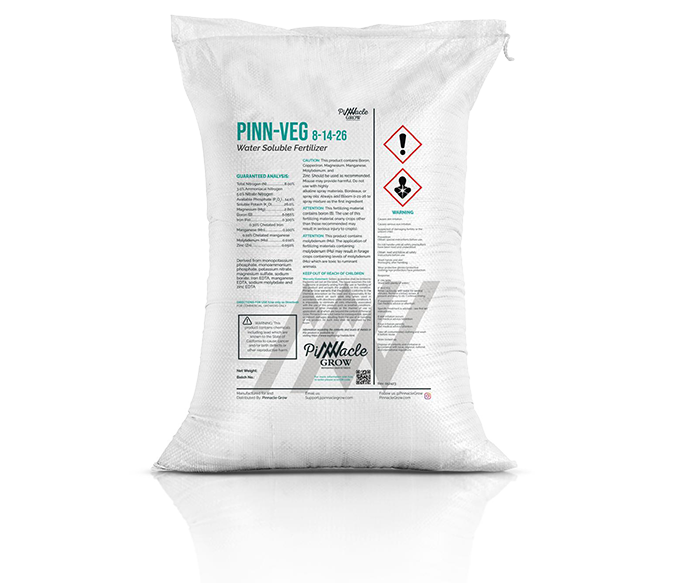 White 25 lb. bag of Pinn-Veg fertilizer with visible branding on a white background