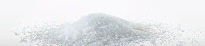 A pile of Magriculture magnesium sulfate heptahydrate rhombic crystals.