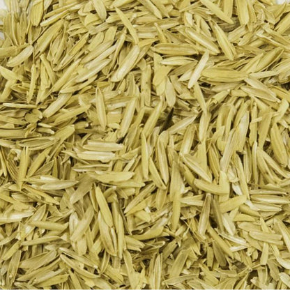 Close-up of yellow rice hulls for soil amendment.