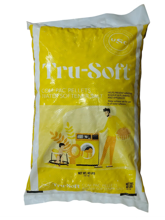 Yellow 40 lb, bag of Tru-Soft Com Pac solar water softener salt on a white background